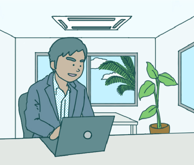 空調のあるオフィスで快適に仕事をしている風景イメージ